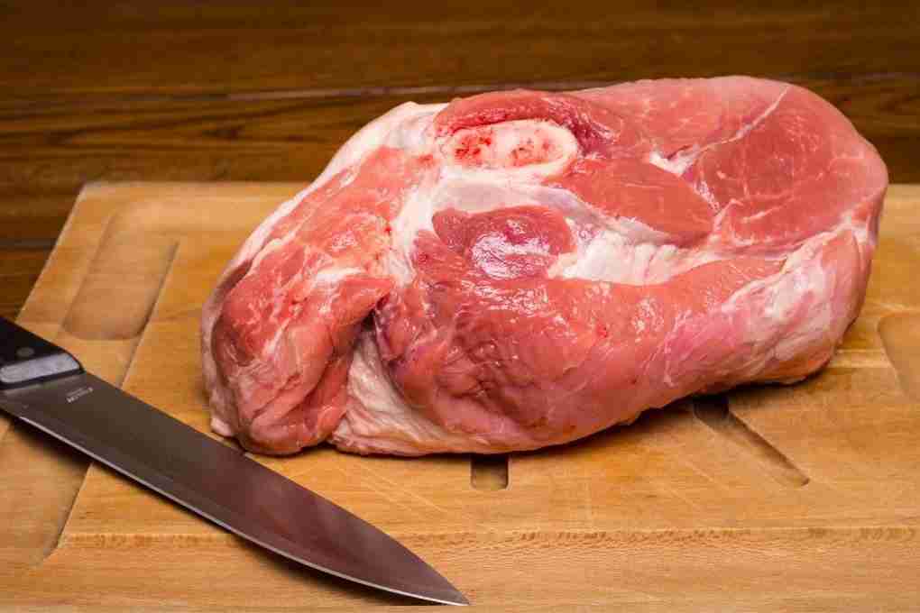 spicy pork shoulder with dark rum - raw pork shoulder