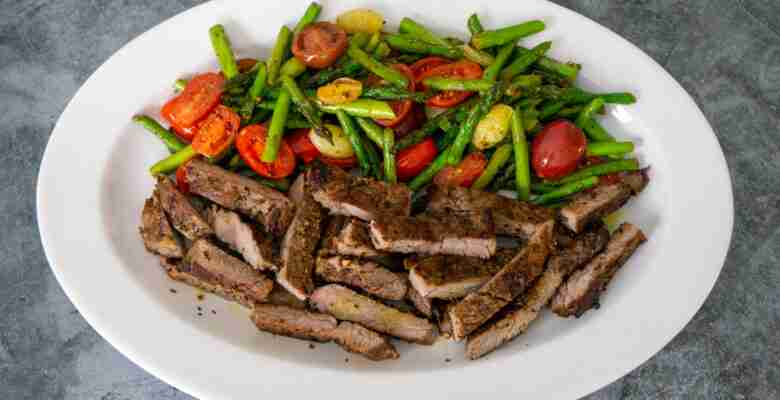 Sauteed Asparagus With Cherry Tomatoes and Steak Dinner
