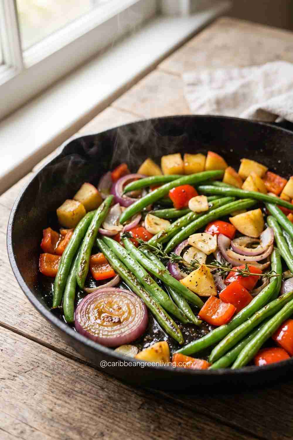 String Beans with Tomatoes and Apples pan on rustic table