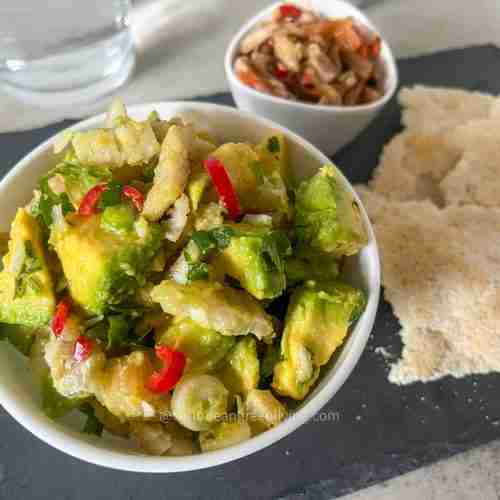 Salted codfish and avocado salad served with cassava bread
