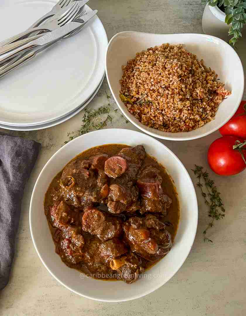 Slow-cooked Curry Goat with Purple Sweet Potatoes served with quinoa