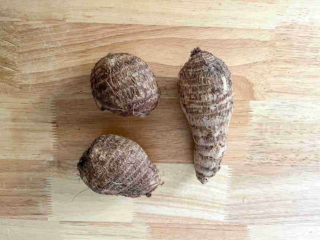What is Eddoe. Eddoe Root Vegetable on cutting board